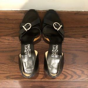 Black heels with silver buckle